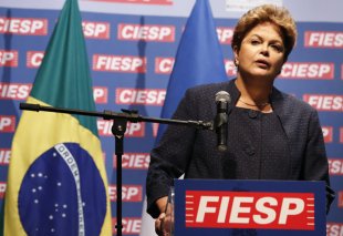Dilma ataca os direitos dos trabalhadores sancionando a lei que institui o Programa de Proteção ao Emprego